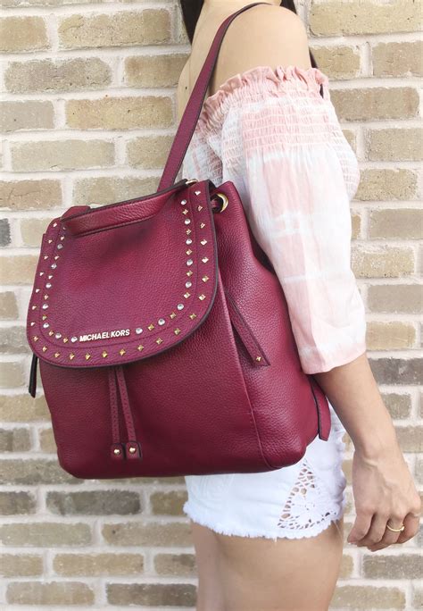 maroon and gold backpack